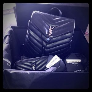 Black YSL purse and wallet.